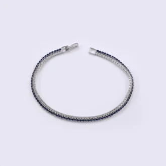 צמיד טניס כסף עם אבני חן בצבעים שונים, מתאים לסיטונאות תכשיטים איכותיים.