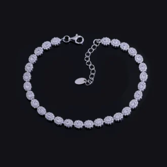 צמיד טניס כסף עם אבני חן, מתאים לסיטונאות תכשיטים איכותיים.