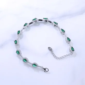 צמיד כסף מעוטרת באבן ירוקה, מושלם לסיטונאות תכשיטים ובפרט תכשיטי כסף.