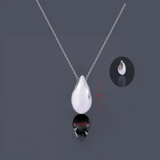 תליון כסף בצורת טיפה, תלוי על שרשרת עדינה, מתאים לתכשיטים בסיטונאות.